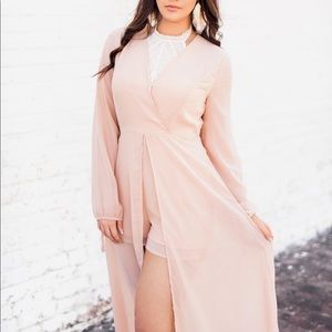 Long sleeve pink romper with over skirt